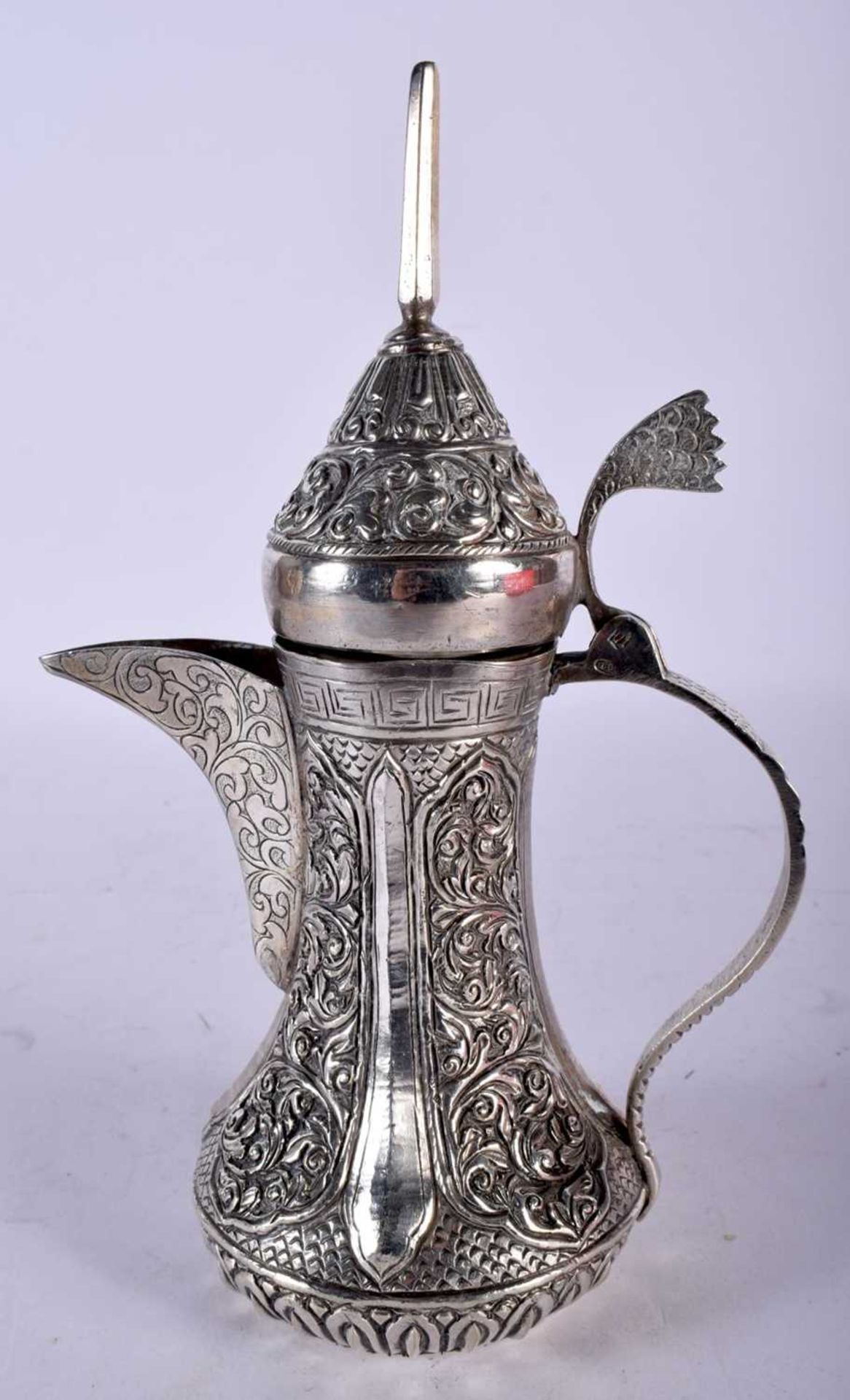 A Continental Silver Middle Eastern Coffee Pot. 20cm x 13cm x 8cm, weight 298g. Dent to rim of pot