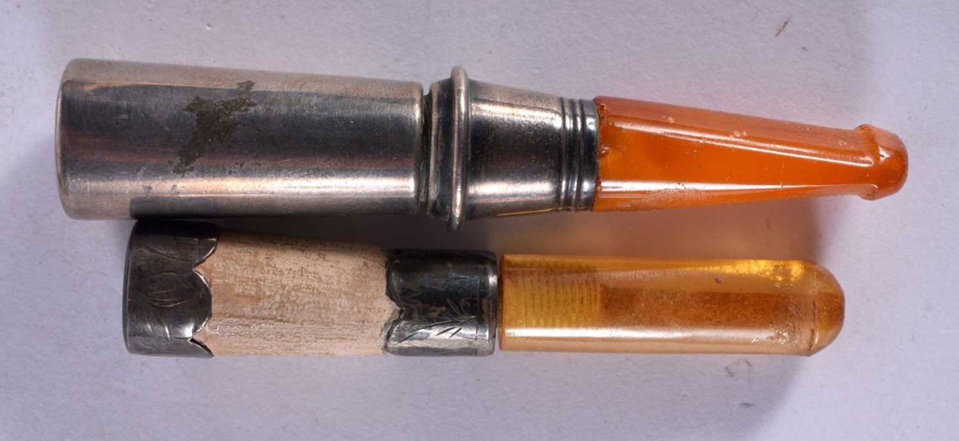 Five Cased Cheroot Holders with Amber Tips and Silver Mounts together with a Silver Cigar Punch (6). - Image 2 of 4