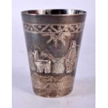 A Middle Eastern Niello Silver Tot Cup. Decorated with a desert scene. Stamped 925, 5.8cm x 4.6cm,