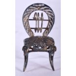 A Silver Filigree Dolls House Furniture Chair. 3.8cm x 2.1cm x 2.4cm, weight 5.5g. Good Condition