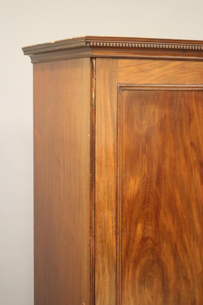 A GEORGIAN MAHOGANY LINEN PRESS, third quarter 18th century, the dentil moulded cornice over two - Image 2 of 3