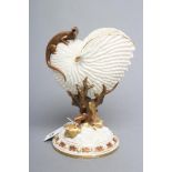 A LATE VICTORIAN ROYAL WORCESTER NAUTILUS VASE surmounted by a lizard, raised upon a bronzed and