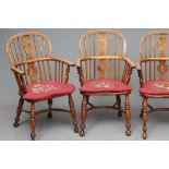 A SET OF SIX ASH AND ELM YORKSHIRE WINDSOR ARMCHAIRS, 19th century, of low hooped bent arm form, the