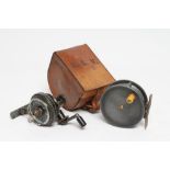 TWO FISHING REELS, comprising a Wallace & Kerr Edinburgh fly reel, with brass foot and leather case,