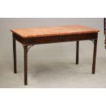 A MAHOGANY AND MARBLE TOP SIDE TABLE, c. 1900, of Georgian design, the moulded edged oblong top over