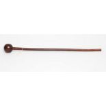 A ZULU KNOBKERRIE, late 20th/early 19th century, with 26 1/4" handle and spherical head, 29" long (
