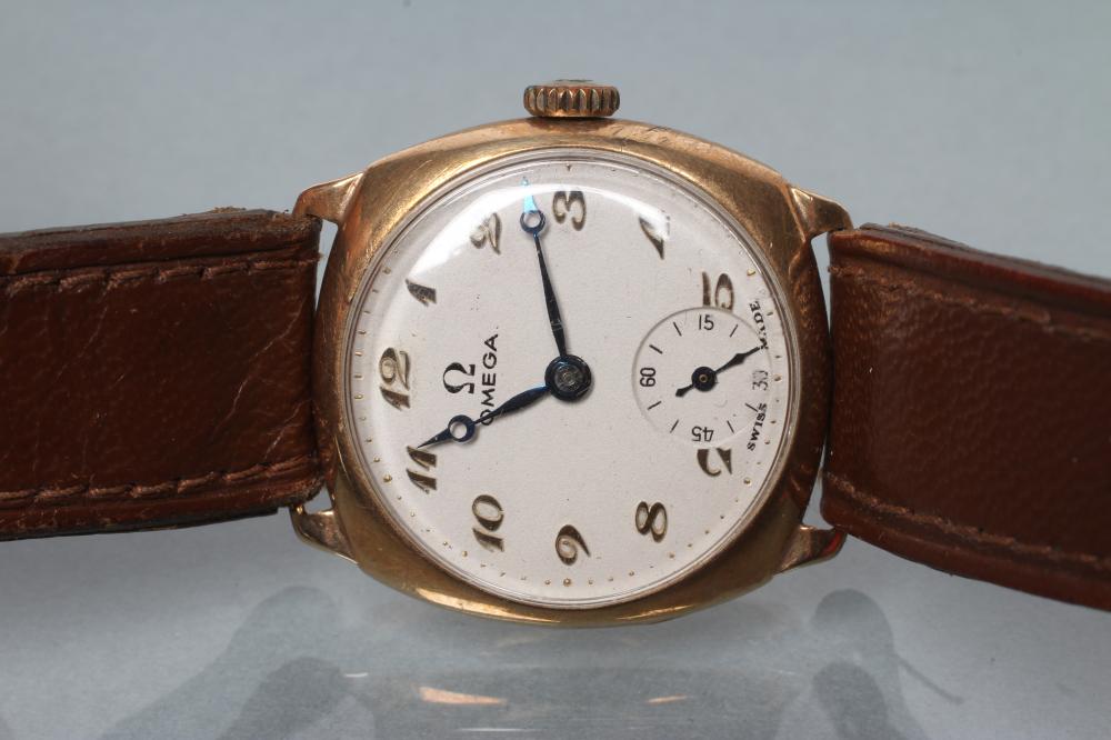 A MID SIZE 9CT GOLD OMEGA WRISTWATCH, the cream dial with applied gilt metal Arabic numerals