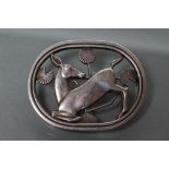 A GEORG JENSEN SILVER KNEELING DEER BROOCH, London 1948, designed by Arno Malinowski, stamped