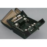 A LADY'S EDWARDIAN TRAVELLING CASE, maker Asprey, London 1908, comprising spirit flask, pair of