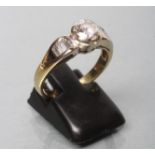 A DIAMOND RING, the old brilliant cut stone of approximately 0.6cts, in rub-over setting to