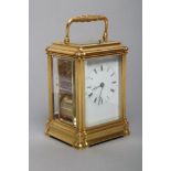 A BRASS CASED CARRIAGE CLOCK, modern, the twin barrel movement with platform escapement striking