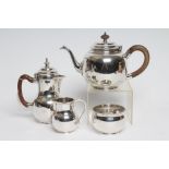 A SILVER FOUR PIECE TEA SERVICE, maker probably Thomas Ducrow & Sons, Birmingham 1946, in George I