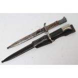 TWO THIRD REICH DRESS BAYONETS, comprising a fireman's bayonet, with 10" blade marked for PUMA,