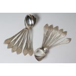 A SET OF TWELVE AMERICAN SILVER TEASPOONS, maker Henrichsen & Greenberg, stamped Sterling, in thread