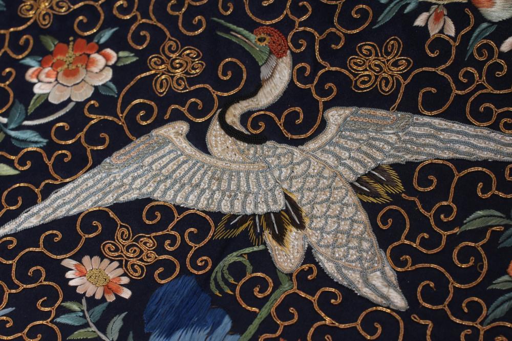 A PAIR OF CHINESE SILK SQUARE PANELS embroidered in coloured silks on a dark navy ground - Image 4 of 24