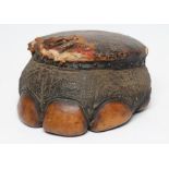 A TAXIDERMY ELEPHANT FOOT STOOL, c.1900, with horse hair stuffed seat, 13 1/2" wide (Est. plus 21%