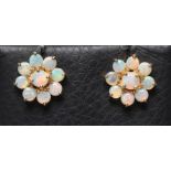 A PAIR OF OPAL CLUSTER EAR STUDS, the nine stones claw set to a plain 14ct gold frame (Est. plus 21%