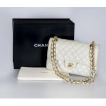 A CHANEL WHITE "CAVIAR" LEATHER QUILTED CLASSIC HANDBAG, with leather and metal chain link handle