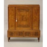 A ROSEWOOD SALON CABINET, first half 20th century, of stepped oblong form, the geometrically