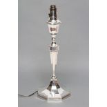 A SILVER ELECTRIC TABLE LAMP BASE, maker Blankensee & Son Ltd., Birmingham 1928, of swept