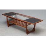 A G-PLAN FRESCO FORMOSA TEAK COFFEE TABLE, 1960/70's, the tapering oblong top with central clear