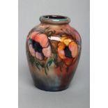A MOORCROFT ANEMONE PATTERN POTTERY VASE, mid 20th century, of rounded ovoid form, tubelined and