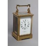 A BRASS CASED CARRIAGE CLOCK, 20th century, the single barrel movement with platform escapement, the