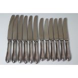 A SET OF SIX SILVER HANDLED TABLE AND DESSERT KNIVES, maker William Yates, Sheffield 1969 (one table