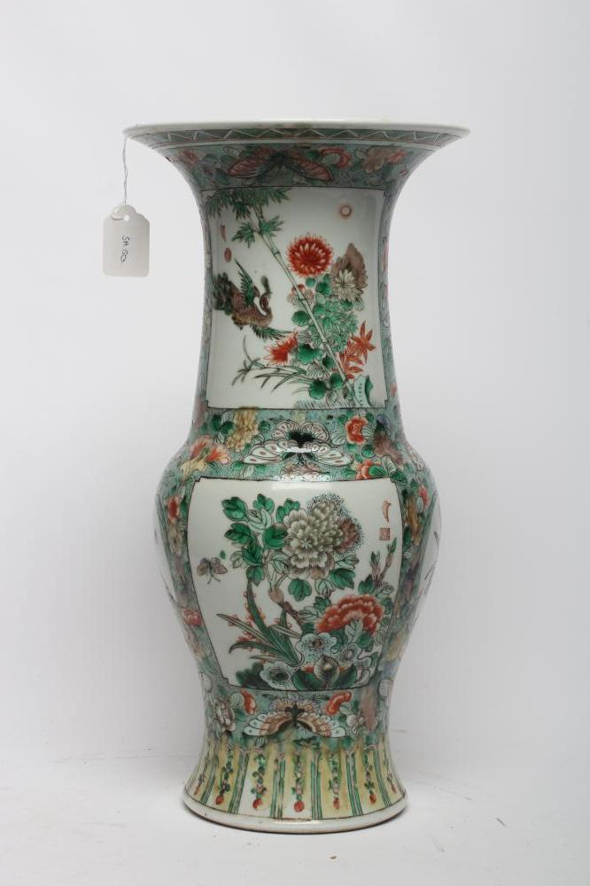 A CHINESE PORCELAIN YEN-YEN VASE painted in famille verte enamels with panels of birds amidst