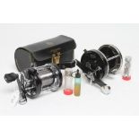 TWO ABU SEA FISHING REELS, comprising one Ambassodeur 6000C with case and accessories, and an
