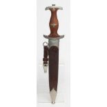 A THIRD REICH SA DAGGER, with 8 5/8" etched blade, reichsadler inset wood grip, metal scabbard and