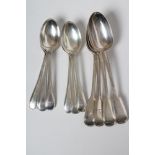 A SET OF FOUR VICTORIAN SILVER TABLESPOONS, maker's mark GA, London 1855, in fiddle and thread