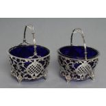 A MATCHED PAIR OF SILVER SWEETMEAT BASKETS, maker Mappin & Webb, Birmingham 1911, and maker's mark D