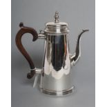 A QUEEN ANNE STYLE SILVER HOT WATER JUG, maker A. Haviland-Nye, London 1969, of plain tapering