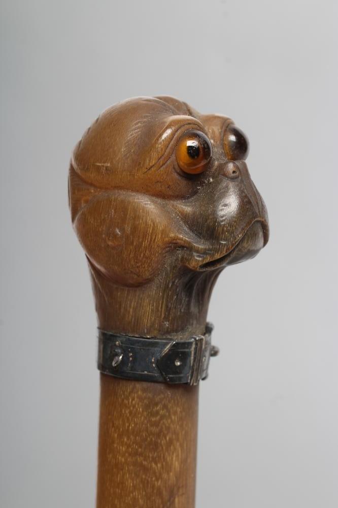 A LATE VICTORIAN HORN LETTER OPENER, the finial carved as a pug's head with amber glass eyes and - Image 2 of 4