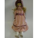 Cuno & Otto Dressel bisque shoulder head doll, with blue glass sleeping eyes, open mouth, teeth,