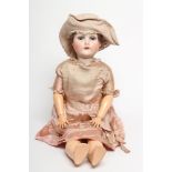 A C. M. Bergmann Waltershausen bisque socket head doll, with blue glass sleeping eyes, open mouth,