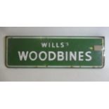 An enamelled Wills Woodbines advertising sign, some rusting to edge, minor scratches, staining to
