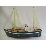 A radio controlled fishing boat Bristol Bay with fitted electric motor and sails, 80cm x 20cm x