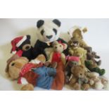 Eleven collector's teddy bears, including A Steiff Manschli panda, A Chad Valley cowboy, five