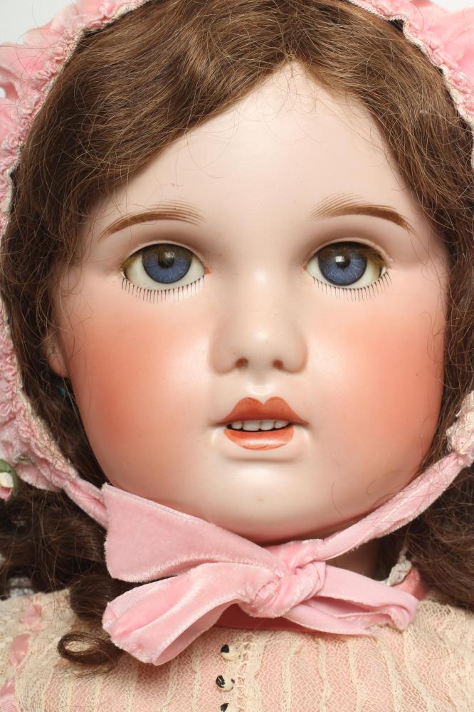 An SFBJ bisque socket head doll, with blue glass fixed eyes, open mouth, moulded teeth, pierced - Bild 2 aus 3