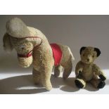 Two vintage plush toys, comprising an 8 1/2" black and orange teddy and a 12 1/2" donkey (Est.