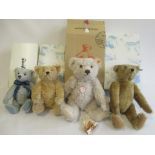 Four boxed Steiff bears, comprising a 42cm classic bear, a 33cm blond bear, a 41cm orange light