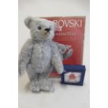 A boxed Steiff Poinsettia, "the Swarovski teddy bear", 26cm in grey plush and with floral glass