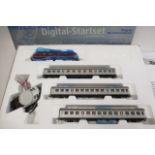 Roco Digital Starter Sert with V200 Diesel locomotive, three D.B. coaches and a small loco-mouse