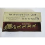 Small coronation coach finished in gold, boxed E (Est. plus 21% premium inc. VAT)