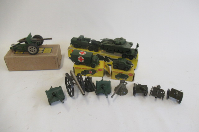 Military models by Dinky, Britains and others including tank transporter, ambulance and field