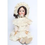 A Hertel, Schwab & Co. bisque socket head doll, with brown glass sleeping eyes, open mouth,