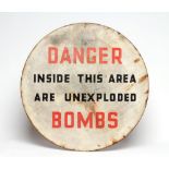 An enamelled un-exploded bomb sign, some chipping to edge, minor staining to sign, over all G (never