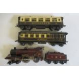 Clockwork Hornby L.M.S. Compound and two Hornby Pullman coaches, minor paint loss to locomotive,